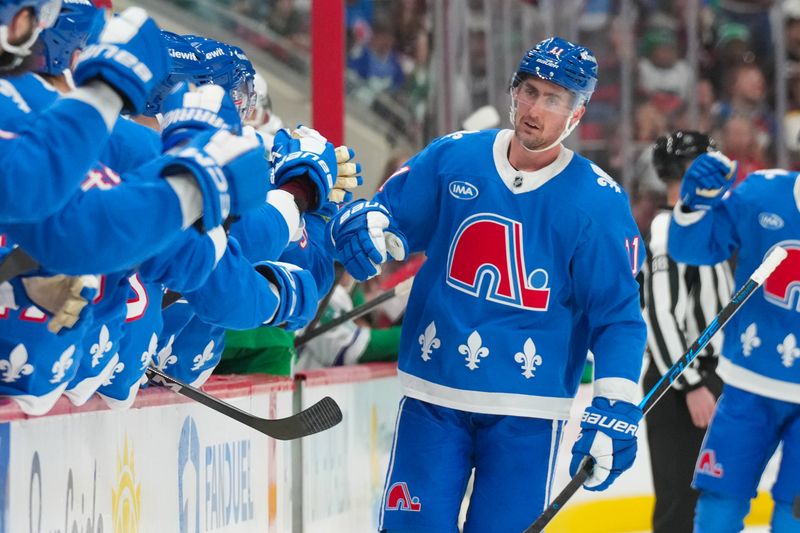 Jan 3, 2026; Raleigh, North Carolina, USA; Colorado Avalanche center Brock Nelson (11) celebrates after scoring a goal against the Carolina Hurricanes during the third period at Lenovo Center. Mandatory Credit: James Guillory-Imagn Images