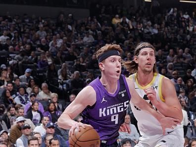 SACRAMENTO, CA - DECEMBER 16: Kevin Huerter #9 of the Sacramento Kings dribbles the ball during the game against the Utah Jazz on December 16, 2023 at Golden 1 Center in Sacramento, California. NOTE TO USER: User expressly acknowledges and agrees that, by downloading and or using this Photograph, user is consenting to the terms and conditions of the Getty Images License Agreement. Mandatory Copyright Notice: Copyright 2023 NBAE (Photo by Rocky Widner/NBAE via Getty Images)