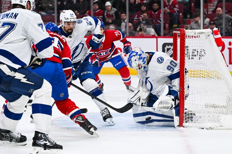 Apr 4, 2024; Montreal, Quebec, CAN; Tampa Bay Lightning goalie Matt Tomkins (90) makes a save against Montreal Canadiens right wing Brendan Gallagher (11) during the third period at Bell Centre. Mandatory Credit: David Kirouac-USA TODAY Sports