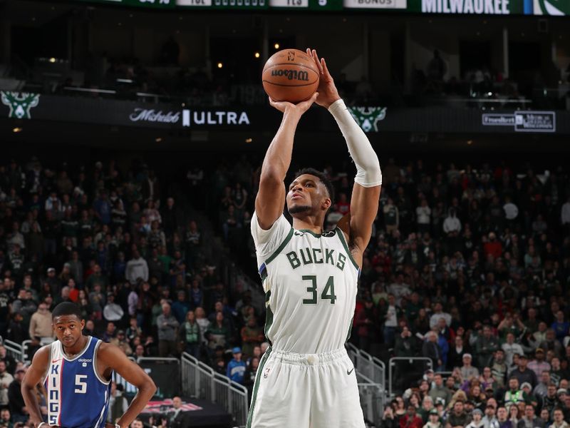 MILWAUKEE, WI - JANUARY 14: Giannis Antetokounmpo #34 of the Milwaukee Bucks shoots a free throw during the game against the Sacramento Kings on January 14, 2024 at the Fiserv Forum Center in Milwaukee, Wisconsin. NOTE TO USER: User expressly acknowledges and agrees that, by downloading and or using this Photograph, user is consenting to the terms and conditions of the Getty Images License Agreement. Mandatory Copyright Notice: Copyright 2024 NBAE (Photo by Gary Dineen/NBAE via Getty Images).