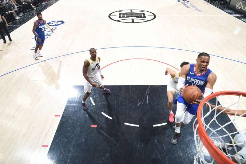 LOS ANGELES, CA - APRIL 5:  Russell Westbrook #0 of the LA Clippers goes to the basket during the game on April 5, 2024 at Crypto.Com Arena in Los Angeles, California. NOTE TO USER: User expressly acknowledges and agrees that, by downloading and/or using this Photograph, user is consenting to the terms and conditions of the Getty Images License Agreement. Mandatory Copyright Notice: Copyright 2024 NBAE (Photo by Adam Pantozzi/NBAE via Getty Images)