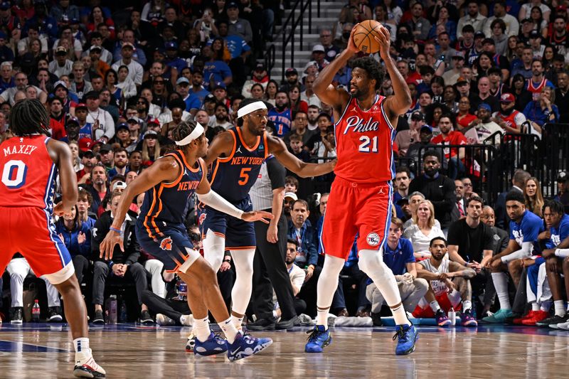 PHILADELPHIA, PA - APRIL 28: Joel Embiid #21 of the Philadelphia 76erslooks to pass the ball during the game against the New York Knicks during Round 1 Game 4 of the 2024 NBA Playoffs on April 28, 2024 at the Wells Fargo Center in Philadelphia, Pennsylvania NOTE TO USER: User expressly acknowledges and agrees that, by downloading and/or using this Photograph, user is consenting to the terms and conditions of the Getty Images License Agreement. Mandatory Copyright Notice: Copyright 2024 NBAE (Photo by David Dow/NBAE via Getty Images)