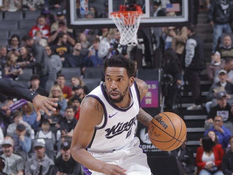SACRAMENTO, CA - MARCH 19: Malik Monk #0 of the Sacramento Kings dribbles the ball during the game against the Cleveland Cavaliers   on March 19, 2025 at Golden 1 Center in Sacramento, California. NOTE TO USER: User expressly acknowledges and agrees that, by downloading and or using this Photograph, user is consenting to the terms and conditions of the Getty Images License Agreement. Mandatory Copyright Notice: Copyright 2025 NBAE (Photo by Rocky Widner/NBAE via Getty Images)