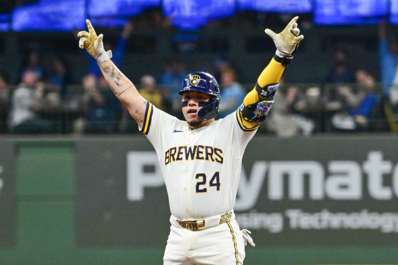 Mar 26, 2026; Milwaukee, Wisconsin, USA;  Milwaukee Brewers catcher William Contreras (24) reacts after hitting a double to drive in 3 runs in the second inning against the Chicago White Sox at American Family Field. Mandatory Credit: Benny Sieu-Imagn Images