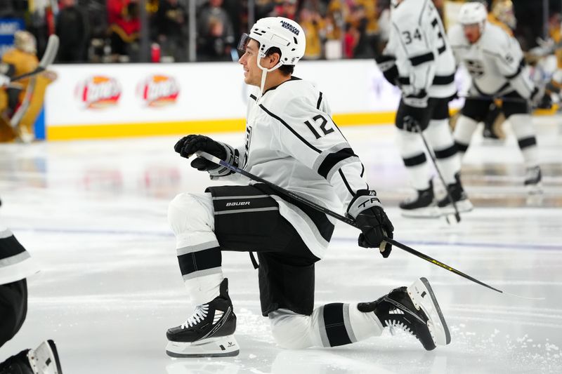 Nov 8, 2023; Las Vegas, Nevada, USA; Los Angeles Kings center Trevor Moore (12) warms up before a game against the Vegas Golden Knights at T-Mobile Arena. Mandatory Credit: Stephen R. Sylvanie-USA TODAY Sports