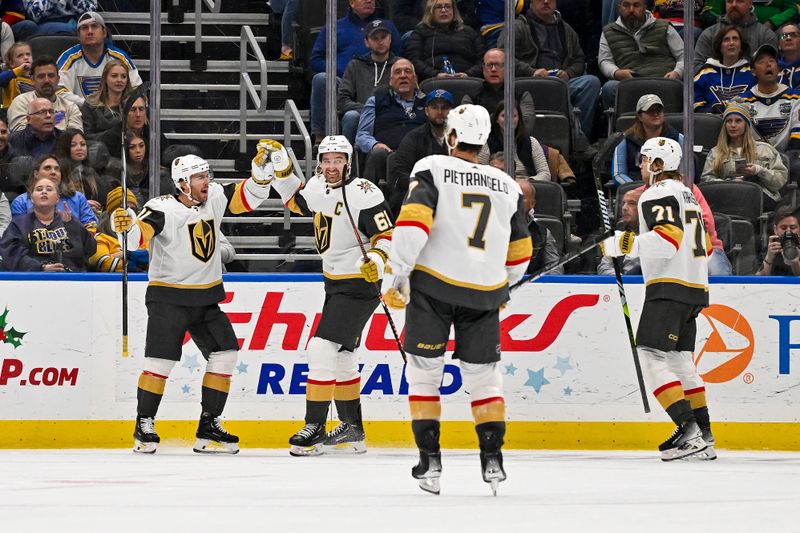 Dec 6, 2023; St. Louis, Missouri, USA;  Vegas Golden Knights right wing Jonathan Marchessault (81) is congratulated by teammates after scoring against the St. Louis Blues during the second period at Enterprise Center. Mandatory Credit: Jeff Curry-USA TODAY Sports