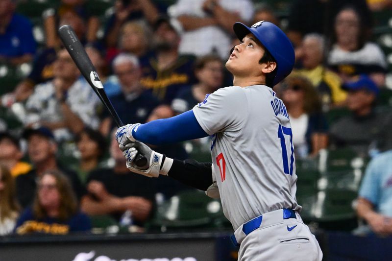 Aug 15, 2024; Milwaukee, Wisconsin, USA; Los Angeles Dodgers designated hitter Shohei Ohtani (17) flies out against the Milwaukee Brewers in the first inning at American Family Field. Mandatory Credit: Benny Sieu-USA TODAY Sports