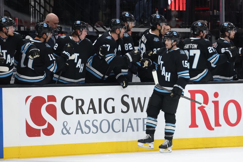 Oct 30, 2024; Salt Lake City, Utah, USA; Utah Hockey Club center Alexander Kerfoot (15) celebrates scoring a goal against the Calgary Flames during the first period at Delta Center. Mandatory Credit: Rob Gray-Imagn Images