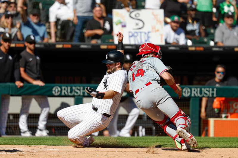 Sep 26, 2024; Chicago, Illinois, USA; Chicago White Sox outfielder Zach DeLoach (31) scores against the Los Angeles Angels during the fifth inning at Guaranteed Rate Field. Mandatory Credit: Kamil Krzaczynski-Imagn Images