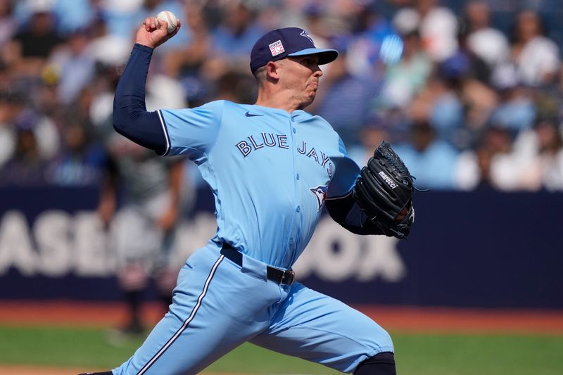 Jul 21, 2024; Toronto, Ontario, CAN; Toronto Blue Jays pitcher Chad Green (57) throws to the Detroit Tigers  during the eighth inning at Rogers Centre. Mandatory Credit: John E. Sokolowski-USA TODAY Sports