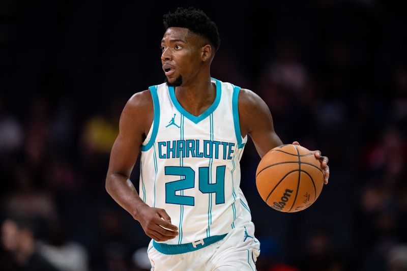 CHARLOTTE, NORTH CAROLINA - OCTOBER 06: Brandon Miller #24 of the Charlotte Hornets brings the ball up court in the first quarter during a preseason game against the New York Knicks at Spectrum Center on October 06, 2024 in Charlotte, North Carolina. NOTE TO USER: User expressly acknowledges and agrees that, by downloading and or using this photograph, User is consenting to the terms and conditions of the Getty Images License Agreement. (Photo by Jacob Kupferman/Getty Images)