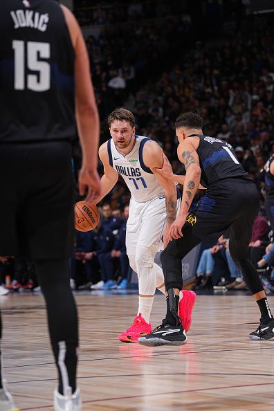 DENVER, CO - DECEMBER 18: Luka Doncic #77 of the Dallas Mavericks handles the ball during the game against the Denver Nuggets on December 18, 2023 at the Ball Arena in Denver, Colorado. NOTE TO USER: User expressly acknowledges and agrees that, by downloading and/or using this Photograph, user is consenting to the terms and conditions of the Getty Images License Agreement. Mandatory Copyright Notice: Copyright 2023 NBAE (Photo by Bart Young/NBAE via Getty Images)