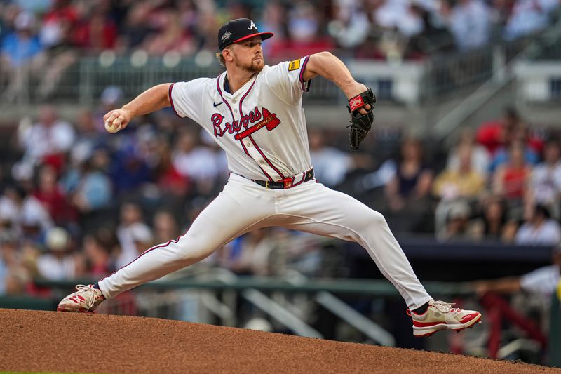 May 13, 2025; Cumberland, Georgia, USA; Atlanta Braves starting pitcher Spencer Schwellenbach (56) pitches against the Washington Nationals during the second inning at Truist Park. Mandatory Credit: Dale Zanine-Imagn Images