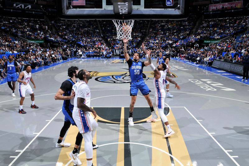 ORLANDO, FL - NOVEMBER 15: Cole Anthony #50 of the Orlando Magic shoots the ball during the game against the Philadelphia 76ers during the Emirates NBA Cup game on  November 15, 2024 at Kia Center in Orlando, Florida. NOTE TO USER: User expressly acknowledges and agrees that, by downloading and or using this photograph, User is consenting to the terms and conditions of the Getty Images License Agreement. Mandatory Copyright Notice: Copyright 2024 NBAE (Photo by Fernando Medina/NBAE via Getty Images)