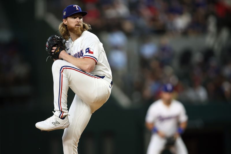 Jun 22, 2024; Arlington, Texas, USA; Texas Rangers pitcher Jon Gray (22) throws a pitch in the first inning against the Kansas City Royals at Globe Life Field. Mandatory Credit: Tim Heitman-USA TODAY Sports