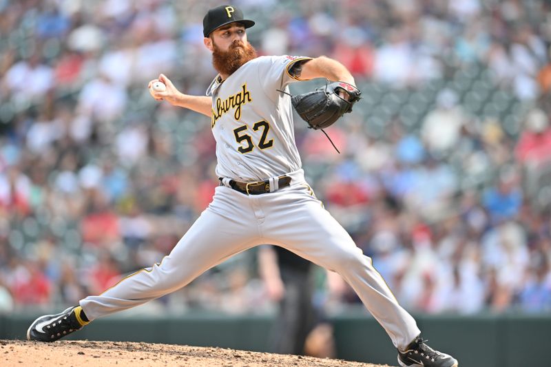 Aug 20, 2023; Minneapolis, Minnesota, USA; Pittsburgh Pirates relief pitcher Colin Selby (52) throws a pitch against the Minnesota Twins during the eighth inning at Target Field. Mandatory Credit: Jeffrey Becker-USA TODAY Sports