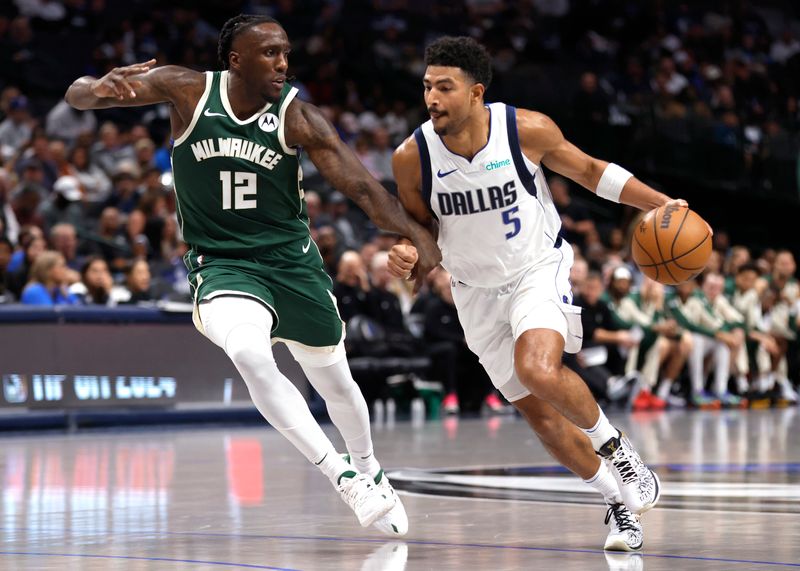 DALLAS, TX - OCTOBER 17: Quentin Grimes #5 of the Dallas Mavericks handles the ball as Taurean Prince #12 of the Milwaukee Bucks defends in the second half of an NBA preseason game at American Airlines Center on October 17, 2024 in Dallas, Texas. NOTE TO USER: User expressly acknowledges and agrees that, by downloading and or using this photograph, User is consenting to the terms and conditions of the Getty Images License Agreement. (Photo by Ron Jenkins/Getty Images)