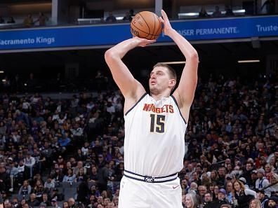 SACRAMENTO, CA - DECEMBER 2: Nikola Jokic #15 of the Denver Nuggets shoots a three point basket during the game against the Sacramento Kings on December 2, 2023 at Golden 1 Center in Sacramento, California. NOTE TO USER: User expressly acknowledges and agrees that, by downloading and or using this Photograph, user is consenting to the terms and conditions of the Getty Images License Agreement. Mandatory Copyright Notice: Copyright 2023 NBAE (Photo by Rocky Widner/NBAE via Getty Images)