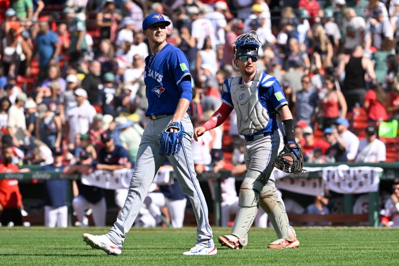 Jun 29, 2025; Boston, Massachusetts, USA; Toronto Blue Jays catcher Tyler Heineman (55)  and relief pitcher Jeff Hoffman (23) celebrate beating the Boston Red Sox at Fenway Park. Mandatory Credit: Eric Canha-Imagn Images