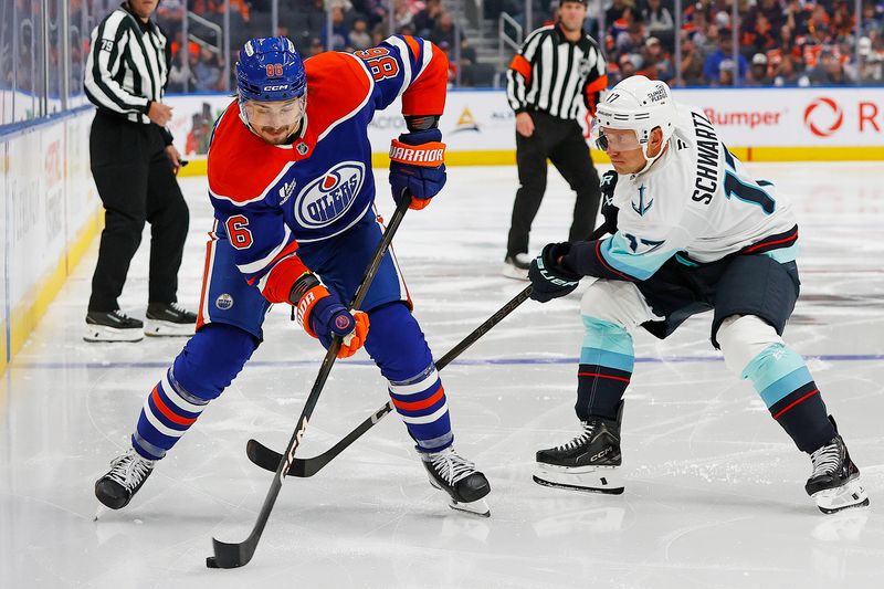 Sep 24, 2025; Edmonton, Alberta, CAN; Edmonton Oilers forward David Tomasek (86) and Seattle Kraken forward Jaden Schwartz (17) battle along the boards for a loose puck during the third period at Rogers Place. Mandatory Credit: Perry Nelson-Imagn Images