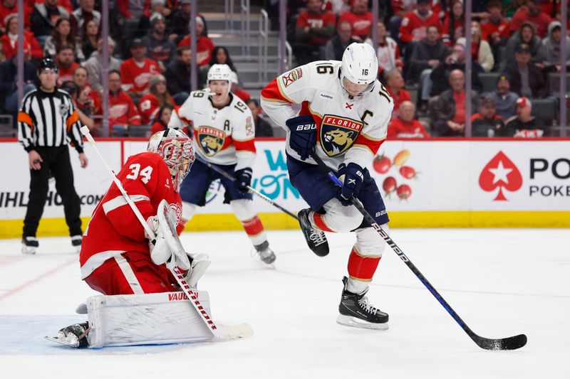 Mar 2, 2024; Detroit, Michigan, USA; Florida Panthers center Aleksander Barkov (16) screens Detroit Red Wings goaltender Alex Lyon (34) on a goal in the third period at Little Caesars Arena. Mandatory Credit: Rick Osentoski-USA TODAY Sports