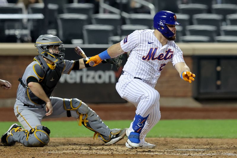 Aug 15, 2023; New York City, New York, USA; New York Mets right fielder DJ Stewart (29) follows through on a single against the Pittsburgh Pirates during the ninth inning at Citi Field. Mandatory Credit: Brad Penner-USA TODAY Sports