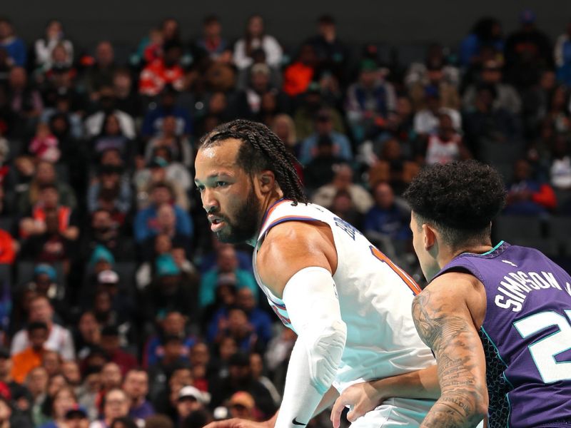 CHARLOTTE, NC - NOVEMBER 29: Jalen Brunson #11 of the New York Knicks looks on during the game against the Charlotte Hornets during the Emirates NBA Cup game on November 29, 2024 at Spectrum Center in Charlotte, North Carolina. NOTE TO USER: User expressly acknowledges and agrees that, by downloading and or using this photograph, User is consenting to the terms and conditions of the Getty Images License Agreement. Mandatory Copyright Notice: Copyright 2024 NBAE (Photo by Kent Smith/NBAE via Getty Images)