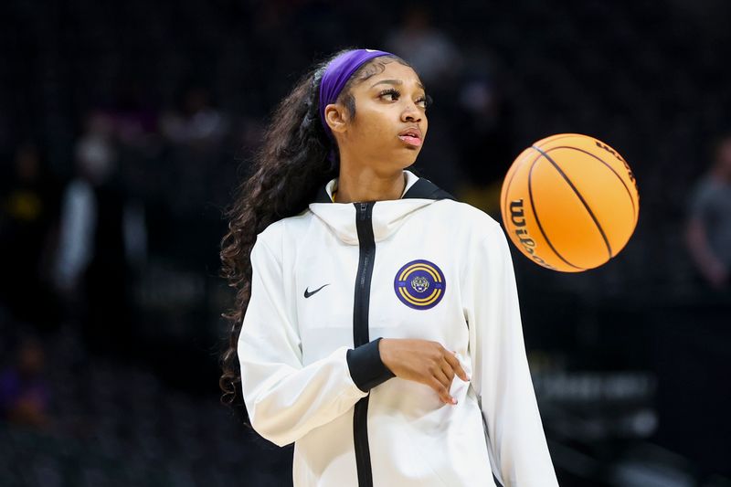 Apr 2, 2023; Dallas, TX, USA; LSU Lady Tigers forward Angel Reese (10) stands on the court during warmups prior to the game against the Iowa Hawkeyes in the final round of the Women's Final Four NCAA tournament at the American Airlines Center. Mandatory Credit: Kevin Jairaj-USA TODAY Sports