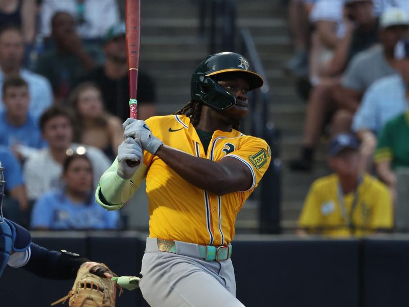 Jun 30, 2025; Tampa, Florida, USA;  Athletics outfielder Lawrence Butler (4) singles against the Tampa Bay Rays during the third inning at George M. Steinbrenner Field. Mandatory Credit: Kim Klement Neitzel-Imagn Images
