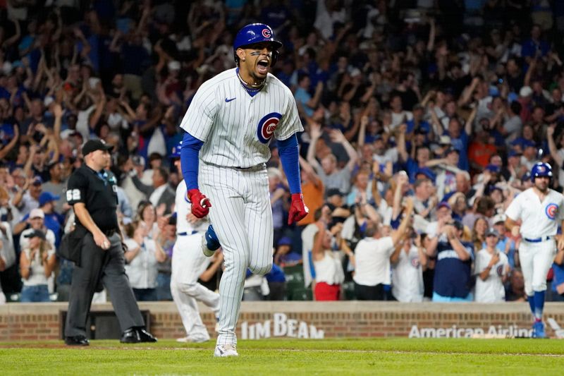 Sep 5, 2023; Chicago, Illinois, USA; Chicago Cubs designated hitter Christopher Morel (5) celebrates his three-run home run against the San Francisco Giants during the seventh inning at Wrigley Field. Mandatory Credit: David Banks-USA TODAY Sports