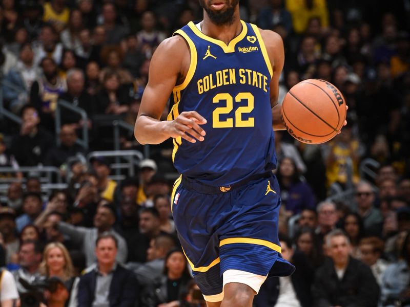 LOS ANGELES, CA - MARCH 16:  Andrew Wiggins #22 of the Golden State Warriors handles the ball during the game  on March 16, 2024 at Crypto.Com Arena in Los Angeles, California. NOTE TO USER: User expressly acknowledges and agrees that, by downloading and/or using this Photograph, user is consenting to the terms and conditions of the Getty Images License Agreement. Mandatory Copyright Notice: Copyright 2024 NBAE (Photo by Andrew D. Bernstein/NBAE via Getty Images)