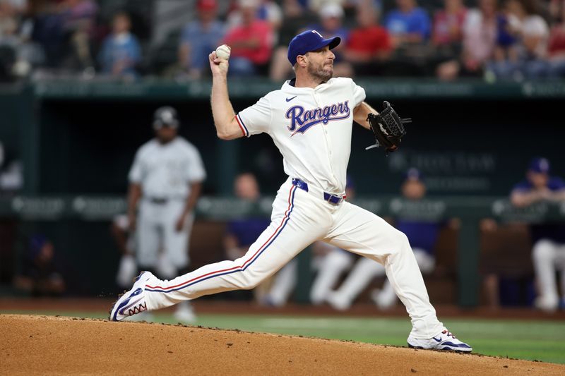 Jul 25, 2024; Arlington, Texas, USA; Texas Rangers pitcher Max Scherzer (31) strikes out Chicago White Sox designated hitter Eloy Jimenez (not pictured) to become 10th on the all-time strike out list in the second inning at Globe Life Field. Mandatory Credit: Tim Heitman-USA TODAY Sports