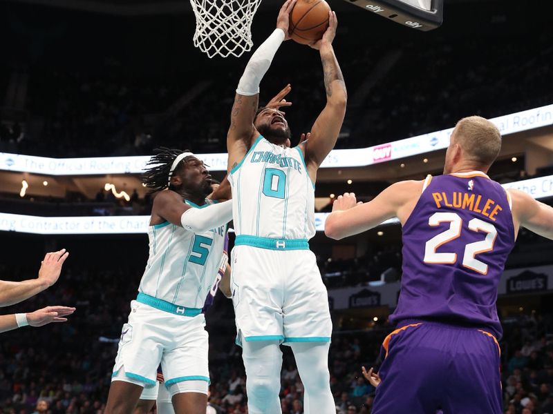 CHARLOTTE, NC - JANUARY 07:  Miles Bridges #0 of the Charlotte Hornets shoots the ball during the game against the Phoenix Suns on January 07, 2025 at Spectrum Center in Charlotte, North Carolina. NOTE TO USER: User expressly acknowledges and agrees that, by downloading and or using this photograph, User is consenting to the terms and conditions of the Getty Images License Agreement. Mandatory Copyright Notice: Copyright 2025 NBAE (Photo by Brock Williams-Smith/NBAE via Getty Images)