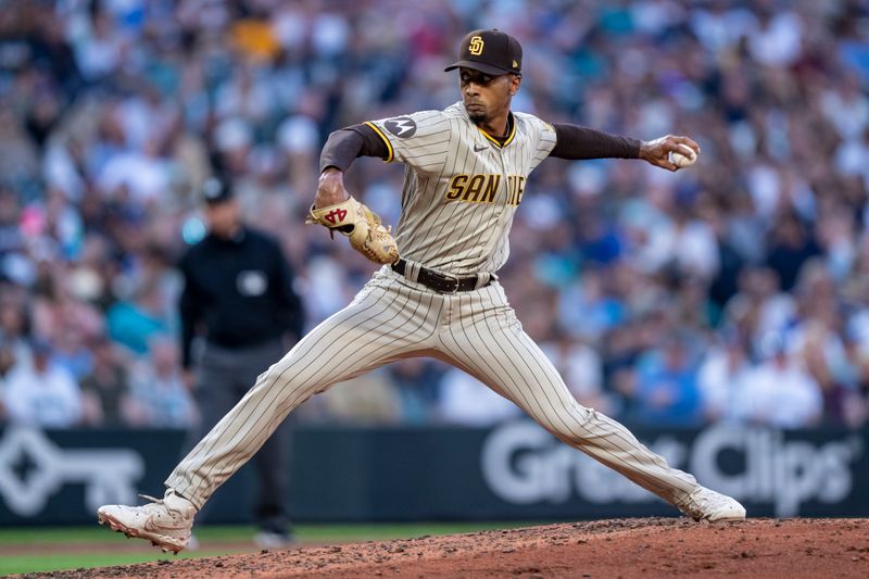 Aug 8, 2023; Seattle, Washington, USA; San Diego Padres reliever Ray Kerr (56) delivers a pitch during the fifth inning against the Seattle Mariners at T-Mobile Park. Mandatory Credit: Stephen Brashear-USA TODAY Sports