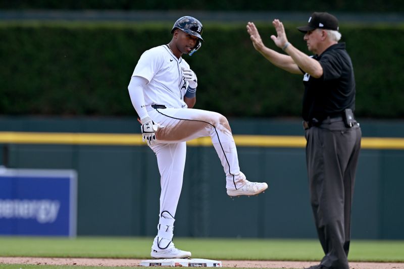 Jun 13, 2024; Detroit, Michigan, USA;  Detroit Tigers designated hitter Justyn-Henry Malloy (44) celebrates at second base after hitting a two-RBI double against the Washington Nationals in the seventh inning at Comerica Park. Mandatory Credit: Lon Horwedel-USA TODAY Sports