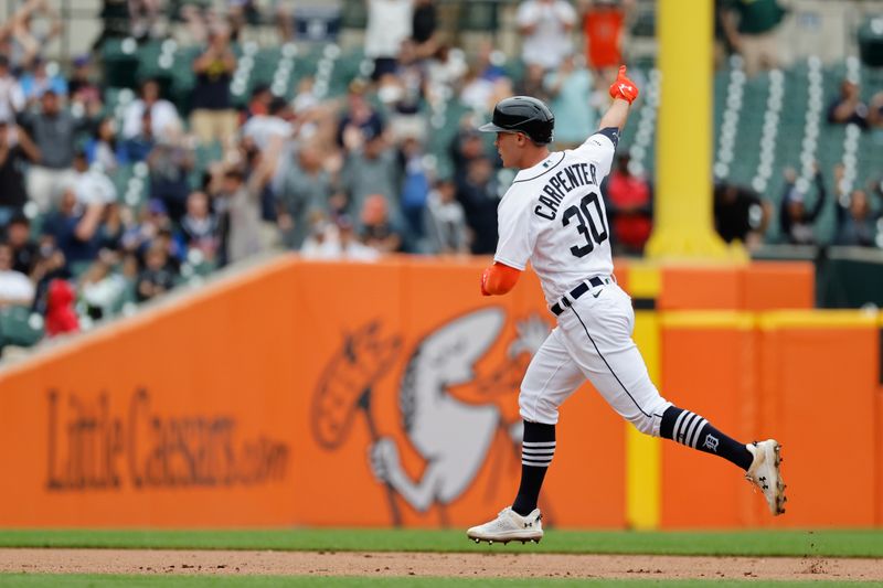 Aug 23, 2023; Detroit, Michigan, USA;  Detroit Tigers right fielder Kerry Carpenter (30) runs the bases after he hits a grand slam in the sixth inning against the Chicago Cubs at Comerica Park. Mandatory Credit: Rick Osentoski-USA TODAY Sports