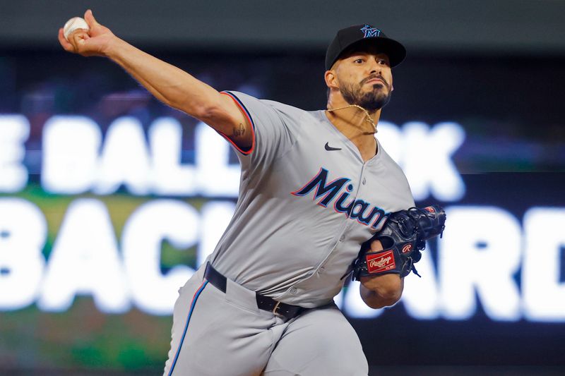 Sep 24, 2024; Minneapolis, Minnesota, USA; Miami Marlins relief pitcher Jesus Tinoco (38) pitches to the Minnesota Twins in the eighth inning at Target Field. Mandatory Credit: Bruce Kluckhohn-Imagn Images