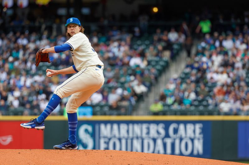 Jun 16, 2024; Seattle, Washington, USA; Seattle Mariners starting pitcher Logan Gilbert (36) throws against the Texas Rangers during the first inning at T-Mobile Park. Mandatory Credit: Joe Nicholson-USA TODAY Sports