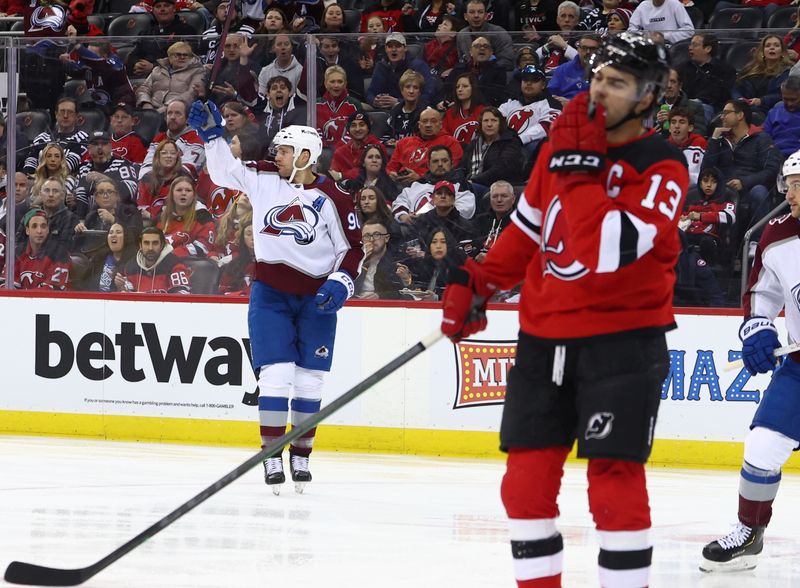 Feb 6, 2024; Newark, New Jersey, USA; Colorado Avalanche right wing Mikko Rantanen (96) celebrates his goal against the New Jersey Devils during the first period at Prudential Center. Mandatory Credit: Ed Mulholland-USA TODAY Sports