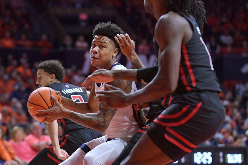 Jan 21, 2024; Champaign, Illinois, USA; Illinois Fighting Illini guard Justin Harmon (4) drives the ball to the basket against the Rutgers Scarlet Knights during the first half at State Farm Center. Mandatory Credit: Ron Johnson-USA TODAY Sports