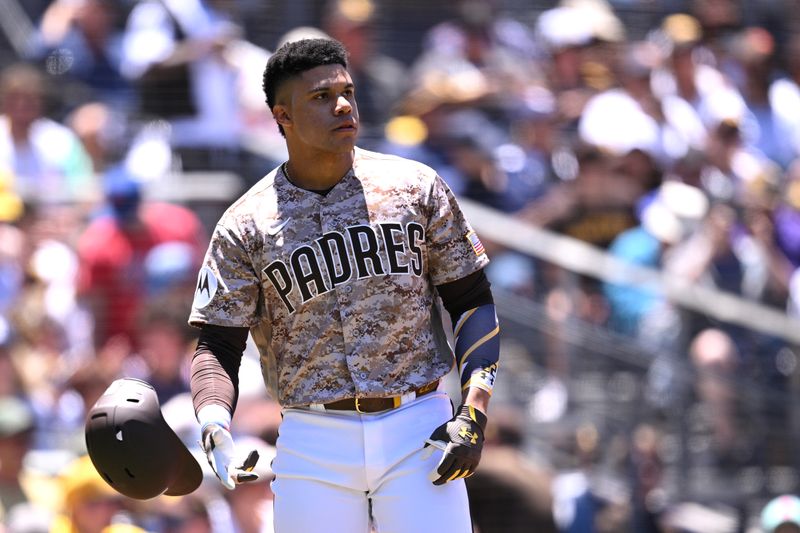 Jun 25, 2023; San Diego, California, USA; San Diego Padres left fielder Juan Soto (22) tosses his helmet after striking out against the Washington Nationals during the third inning at Petco Park. Mandatory Credit: Orlando Ramirez-USA TODAY Sports