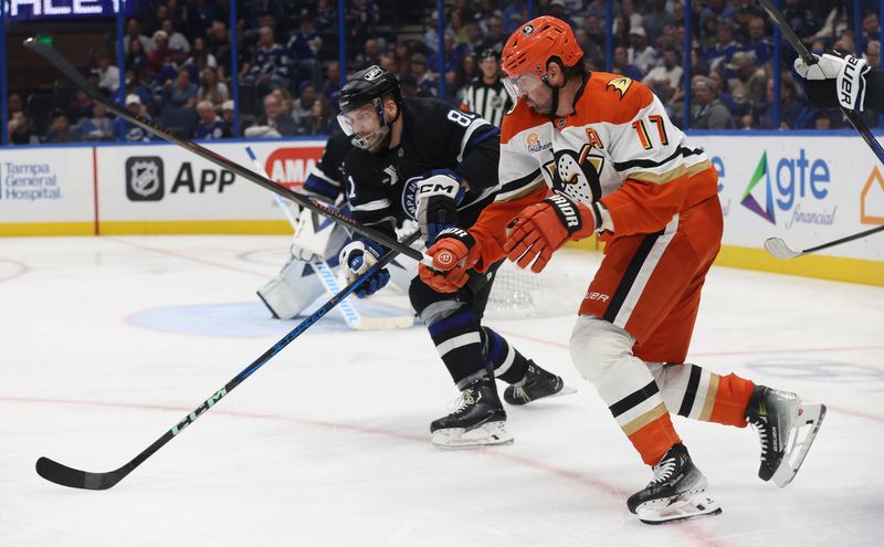 Oct 25, 2025; Tampa, Florida, USA;Anaheim Ducks left wing Alex Killorn (17) skates as Tampa Bay Lightning defenseman Erik Cernak (81) defends  during the second period at Benchmark International Arena. Mandatory Credit: Kim Klement Neitzel-Imagn Images
