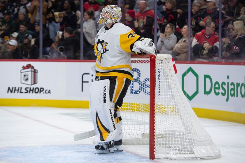 Dec 14, 2024; Ottawa, Ontario, CAN; Pittsburgh Penguins goalie Tristan Jarry (35) reacts to a goal scored in the first period against the Ottawa Senators at the Canadian Tire Centre. Mandatory Credit: Marc DesRosiers-Imagn Images