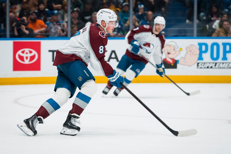 Nov 9, 2025; Vancouver, British Columbia, CAN; Colorado Avalanche defenseman Cale Makar (8) /handles the puck against the Vancouver Canucks in the second period at Rogers Arena. Mandatory Credit: Bob Frid-Imagn Images