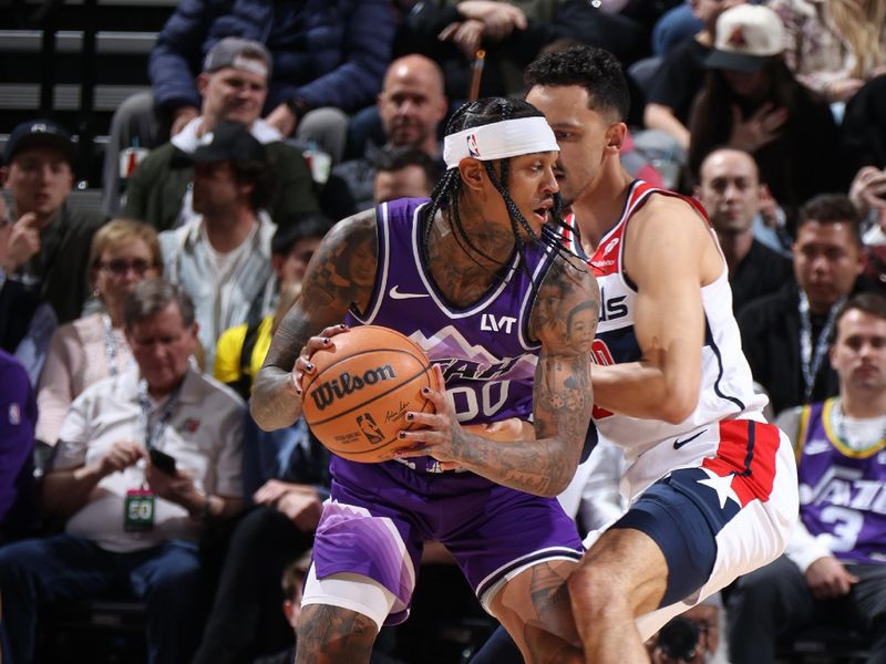 SALT LAKE CITY, UT - MARCH 4:  Jordan Clarkson #00 of the Utah Jazz handles the ball during the game against the Washington Wizards on March 4, 2024 at vivint.SmartHome Arena in Salt Lake City, Utah. NOTE TO USER: User expressly acknowledges and agrees that, by downloading and or using this Photograph, User is consenting to the terms and conditions of the Getty Images License Agreement. Mandatory Copyright Notice: Copyright 2024 NBAE (Photo by Melissa Majchrzak/NBAE via Getty Images)