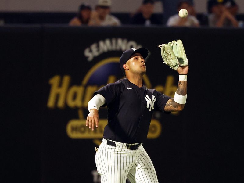 Mar 7, 2024; Tampa, Florida, USA;  New York Yankees outfielder Everson Pereira (80) catches a fly ball during the second inning against the Detroit Tigers at George M. Steinbrenner Field. Mandatory Credit: Kim Klement Neitzel-USA TODAY Sports