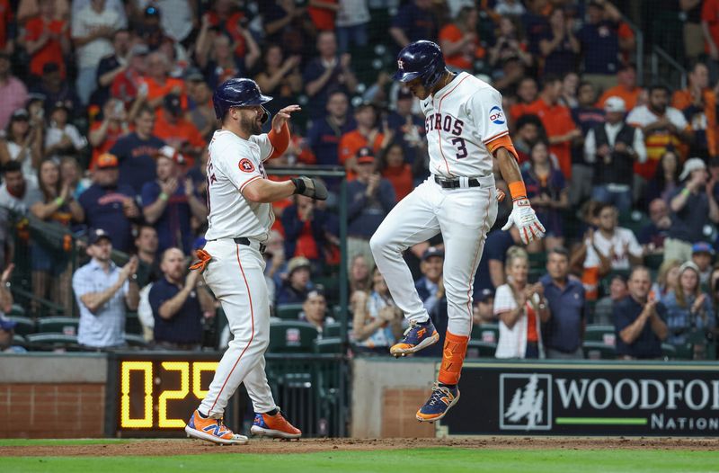 Apr 3, 2024; Houston, Texas, USA; Houston Astros shortstop Jeremy Pena (3) celebrates with left fielder Chas McCormick (20) after hitting a home run during the seventh inning against the Toronto Blue Jays at Minute Maid Park. Mandatory Credit: Troy Taormina-USA TODAY Sports