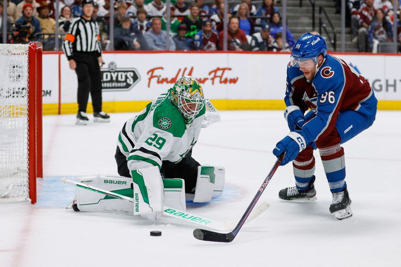 May 11, 2024; Denver, Colorado, USA; Dallas Stars goaltender Jake Oettinger (29) defends against Colorado Avalanche right wing Mikko Rantanen (96) in the second period in game three of the second round of the 2024 Stanley Cup Playoffs at Ball Arena. Mandatory Credit: Isaiah J. Downing-USA TODAY Sports