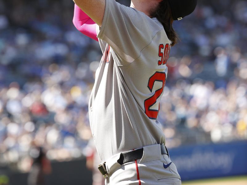 May 11, 2025; Kansas City, Missouri, USA; Boston Red Sox first base Nick Sogard (20) makes the final catch to end the game at Kauffman Stadium. Mandatory Credit: Gary Rohman-Imagn Images