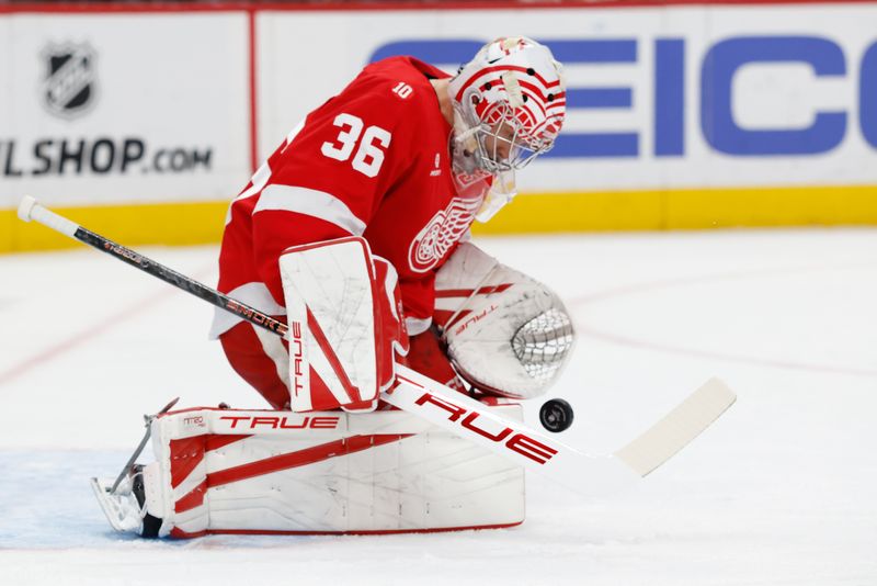 Jan 8, 2026; Detroit, Michigan, USA;  Detroit Red Wings goaltender John Gibson (36) makes the save in the first period against the Vancouver Canucks at Little Caesars Arena. Mandatory Credit: Rick Osentoski-Imagn Images